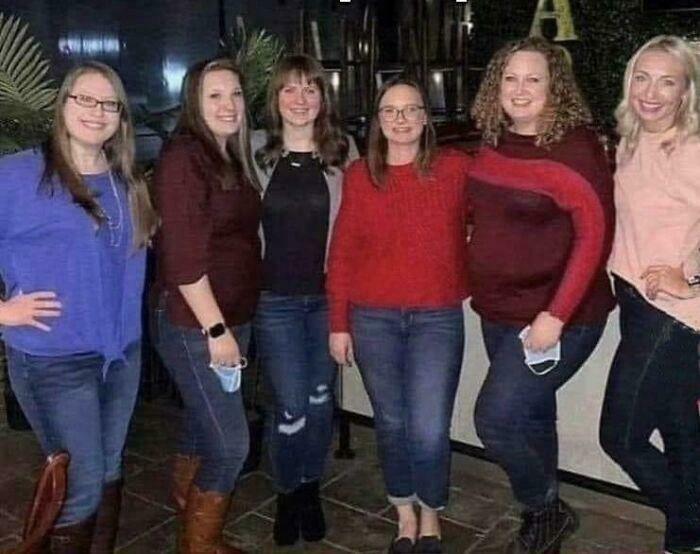 Six women posing for a group photo in casual outfits, showcasing confusing optical illusion effect.