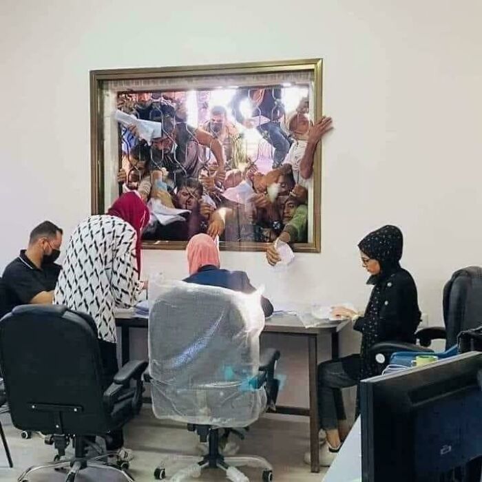 Window Of Desperation: Paperwork In A Middle Eastern Governmental Building