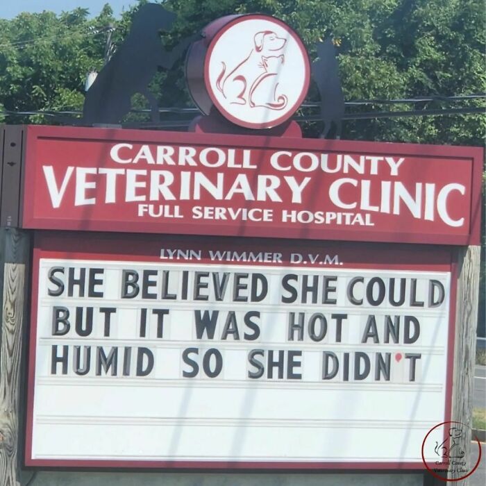 Veterinary clinic sign with a clever joke about hot and humid weather affecting motivation.