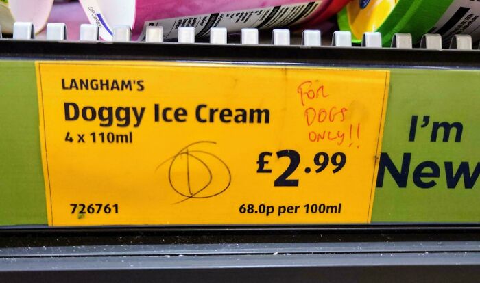 Doggy ice cream shelf label with handwritten note "For dogs only" captures delightfully British humor.