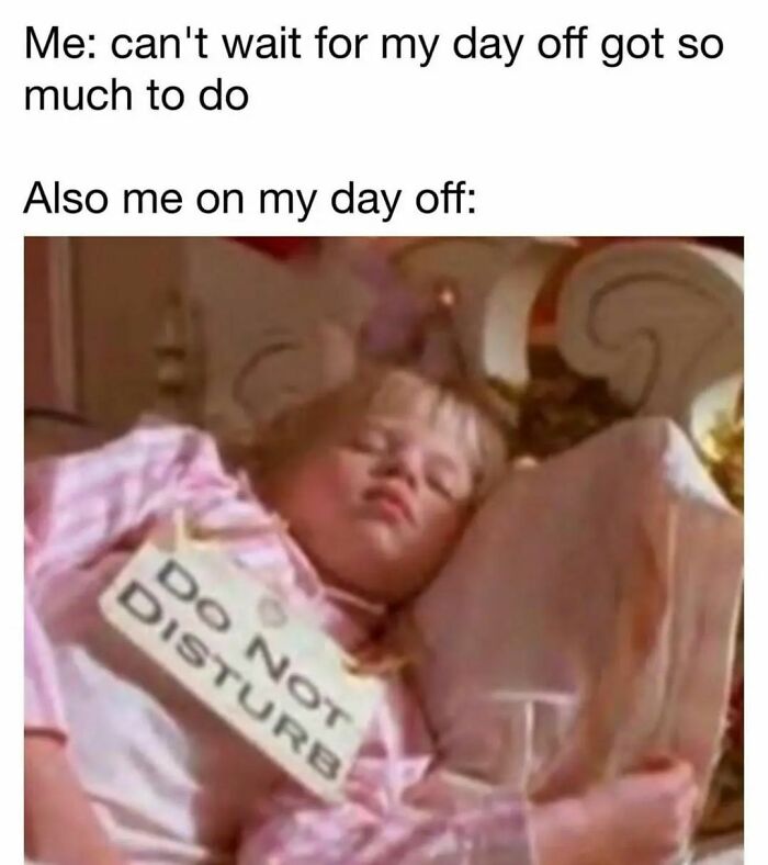 Child asleep in bed wearing a Do Not Disturb sign, illustrating hilarious and relatable memes about taking a day off from work.