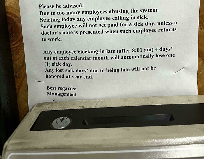 Notice from management warning employees about sick leave and late clock-ins, highlighting capitalism's absurd workplace rules.