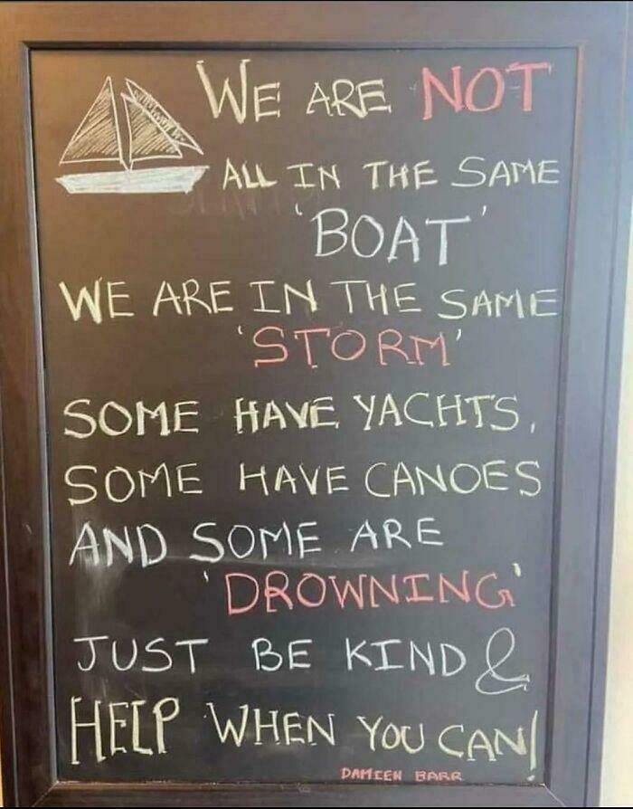 Chalkboard message illustrating inequality with boats, highlighting how capitalism creates uneven challenges in the same storm.