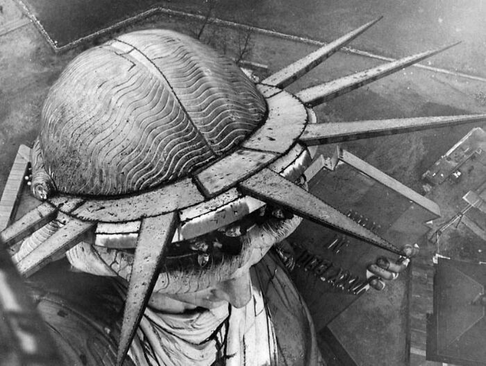 Aerial view of the Statue of Liberty's head and crown, offering a new perspective on this famous landmark.