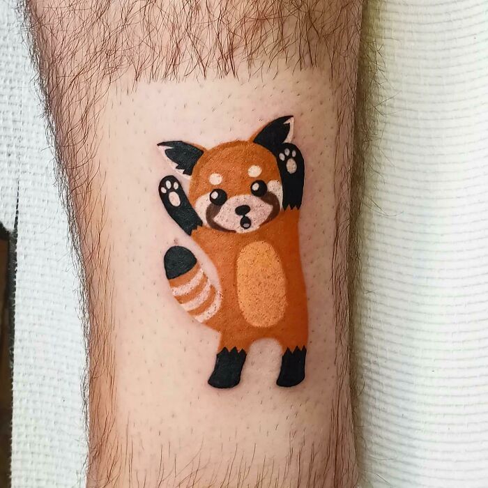 Cute red panda tattoo showcasing exceptional design by a tattoo artist.