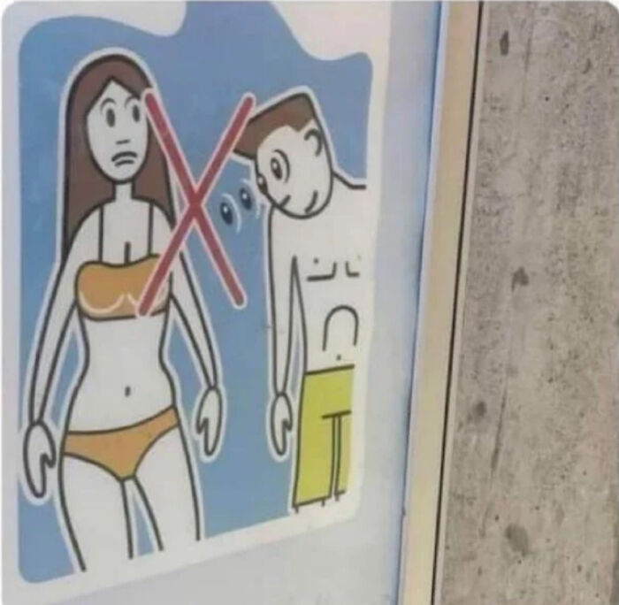 Cartel en una piscina para quienes miran los pechos a las mujeres