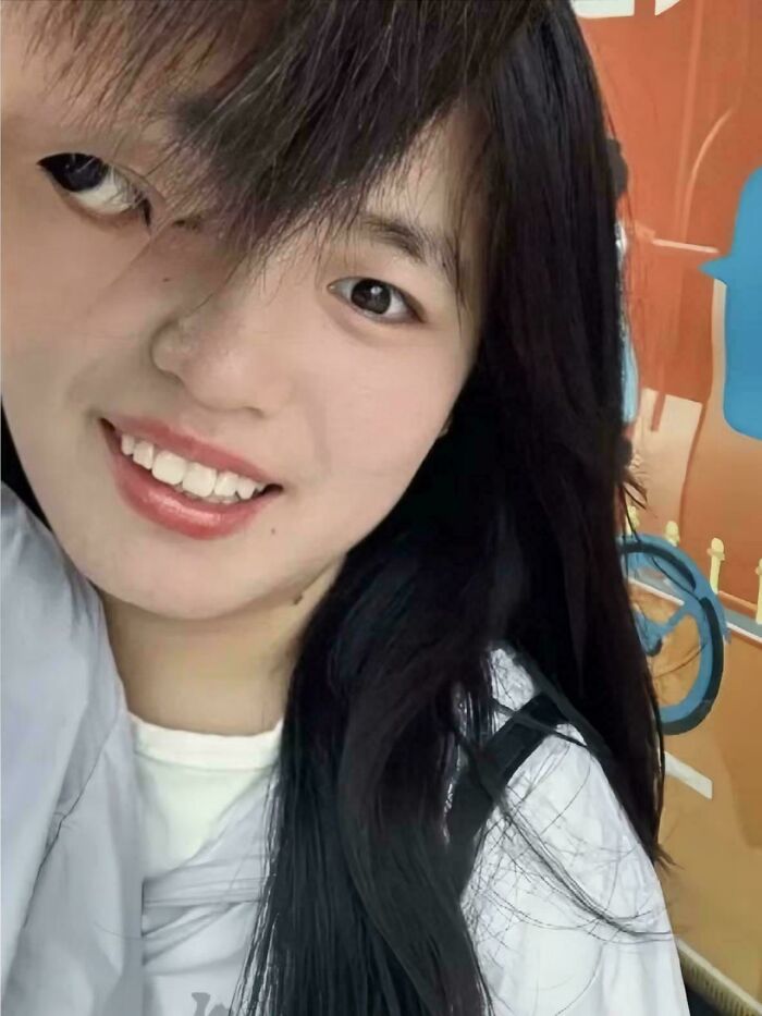 Confusing image of a girl's face seemingly combined with another, creating an optical illusion.