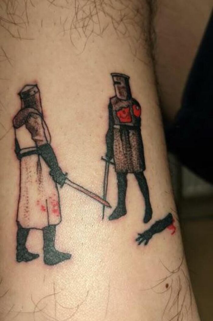 Tattoo artists showcase creative design featuring two medieval knights and a severed limb.