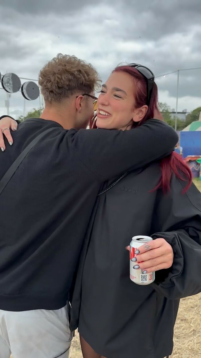 Dua Lipa "Desperate For Escape" As Fan Forces Her To Listen To His Song At Glastonbury