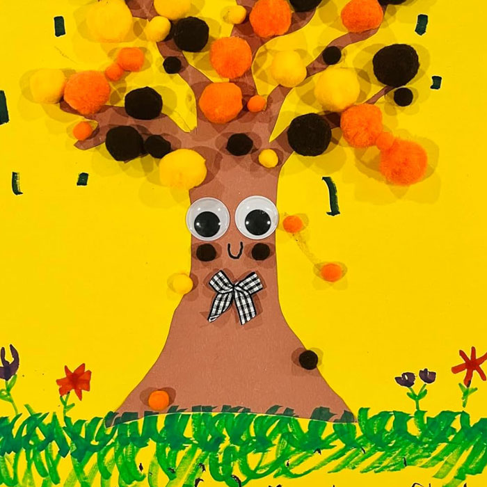 Cute tree craft with googly eyes and pom-poms, perfect for a ridiculous finds collection.
