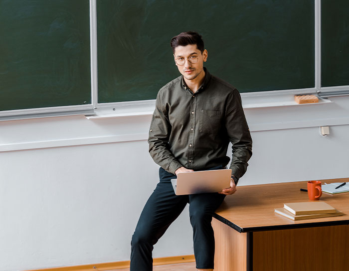 Teacher Banned From Wearing Sneakers Due To Dress Code, Responds With Goth Platform Boots Teacher Banned From Wearing Sneakers Due To Dress Code, Responds With Goth Platform Boots