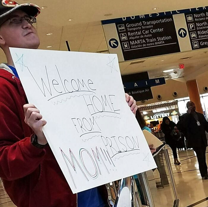 I Saw This Guy In An Airport Today. His Words: "Mom Said She Wanted A Sign, But She Never Said What She Wanted On The Sign"