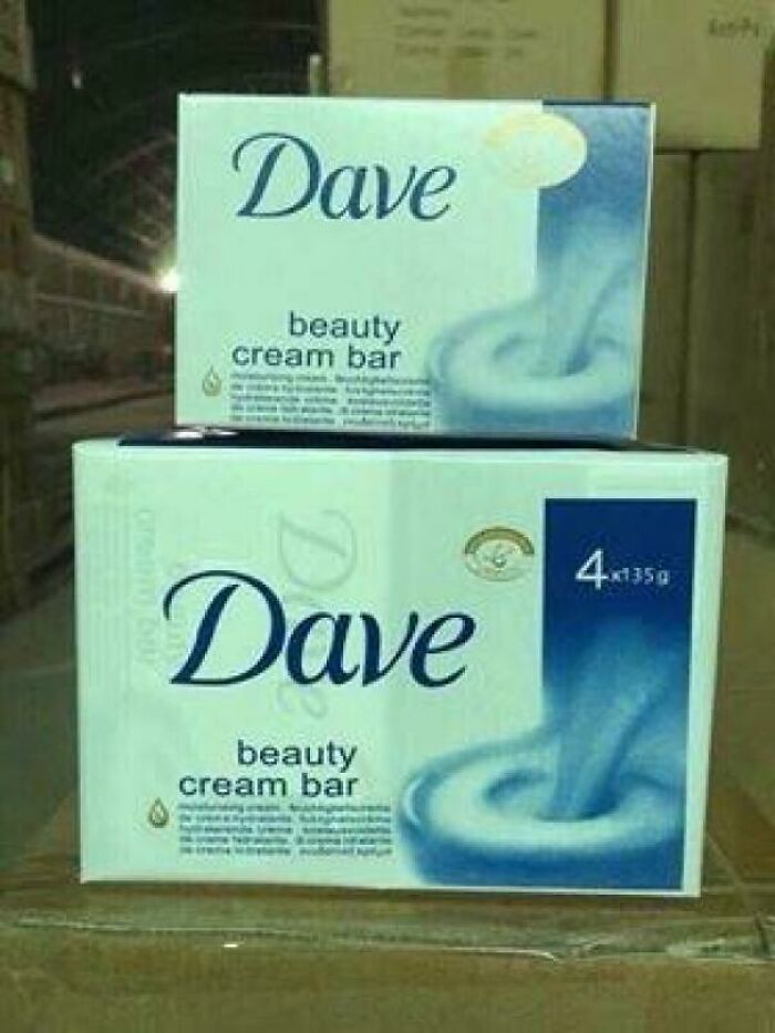 Boxes of Dave beauty cream bar soap, a hilariously bad rip-off of a well-known brand displayed on a surface.