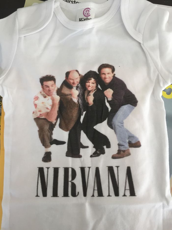 White baby onesie featuring a hilariously bad rip-off design with a group photo and the word Nirvana printed below.