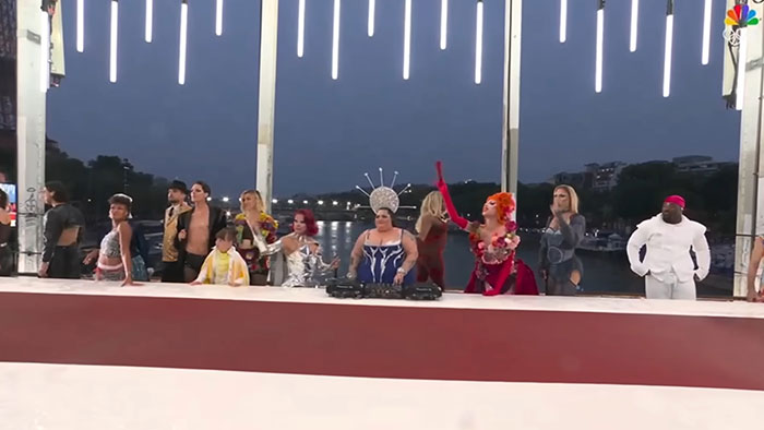Activist Faces Backlash Over Misinterpreted &ldquo;Last Supper&rdquo; Act At Olympics, Files Suit