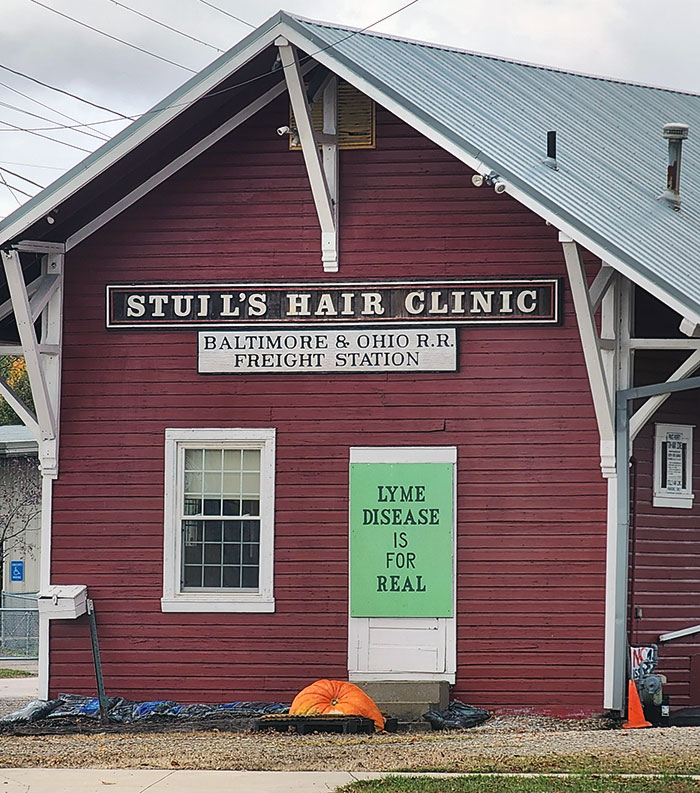 This Barber Shop With A Sign On The Side Implying People Don't Think Lyme Disease Is For Real