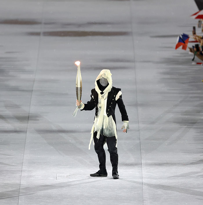 Masked Torch Bearer At The 2024 Olympics Finally Revealed&mdash;Mystery Surrounds 11 Other Athletes