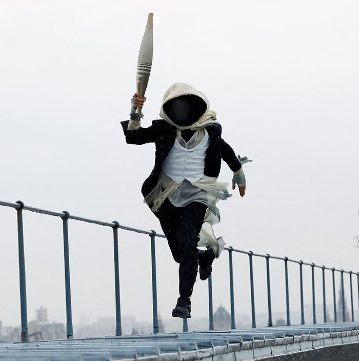 Masked Torch Bearer At The 2024 Olympics Finally Revealed&mdash;Mystery Surrounds 11 Other Athletes