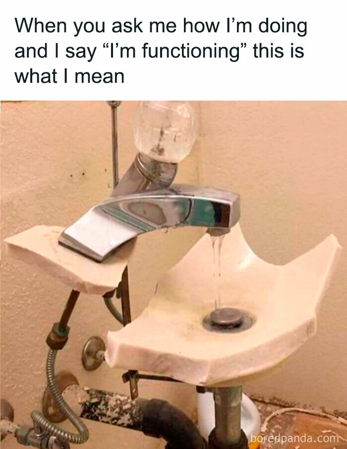 Broken sink with a tap still functioning humorously; a funny random meme.