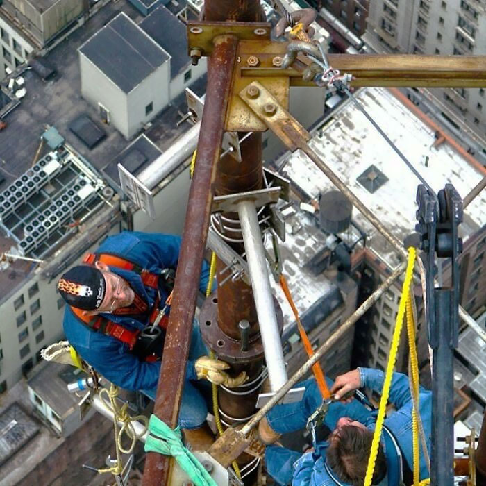 Took This Photo While These Two Guys Worked On The Side Of The Empire State Building In New York, USA