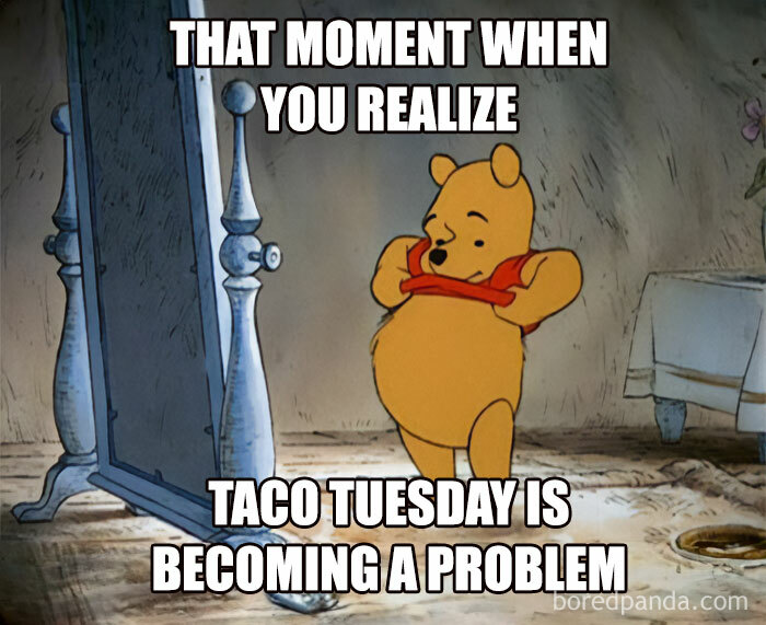 Winnie the Pooh looking in a mirror, humorously reacting to eating too much on Taco Tuesday.