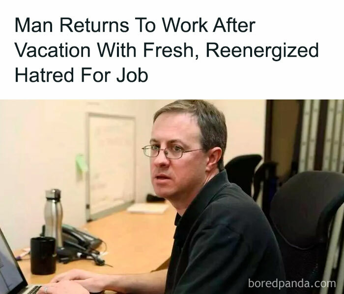 A vacation meme showing a man with glasses sitting at his office desk, looking disinterested and annoyed. The text above the image reads, "Man returns to work after vacation with fresh, reenergized hatred for job."