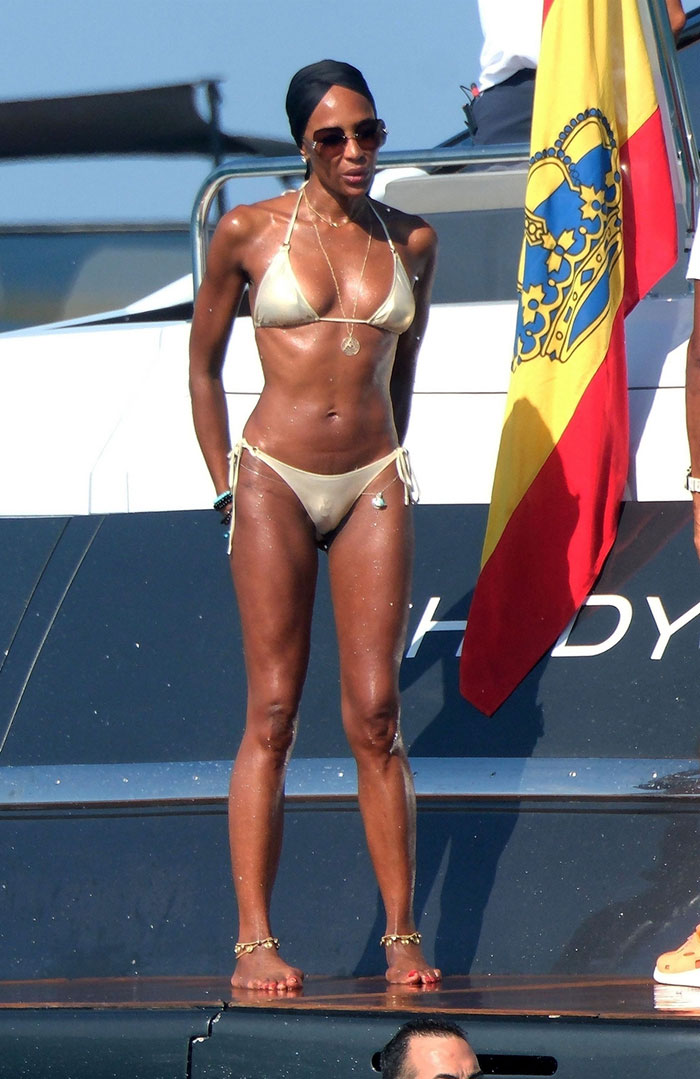 Naomi Campbell&rsquo;s Bikini Pics Have Fans Asking, &ldquo;What The Hell Is In Her Bathing Suit?&rdquo;