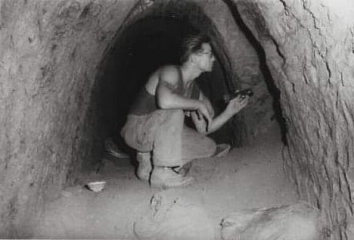 Lance Corporal Robert A. Bishop Explores A Viet Cong Tunnel Complex Found By Leathernecks Of The 2nd Battalion, 26th Marines