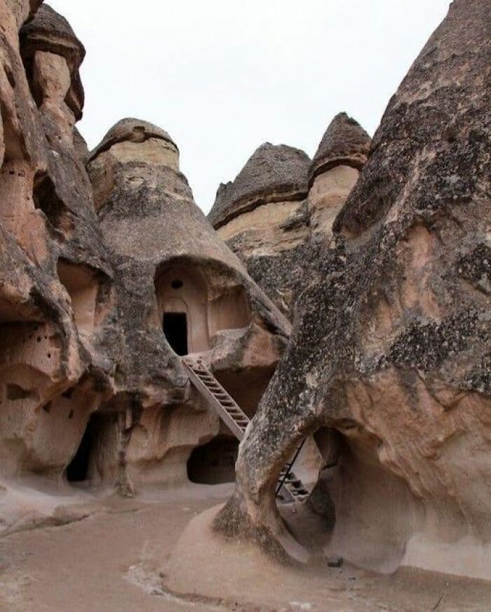The Fairy Chimneys In Cappadocia, Turkey, Are A Surreal Natural Wonder. These Unique Rock Formations, Sculpted By Volcanic Activity And Erosion Over Thousands Of Years, Create An Otherworldly Landscape