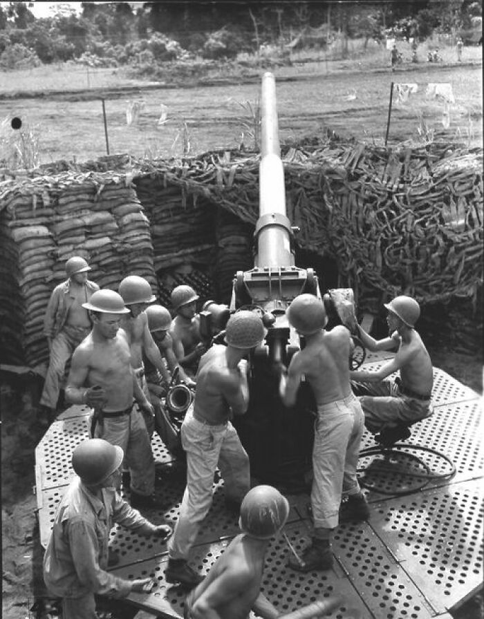 A U.S. Army Anti-Aircraft Gun Crew Manning Their 3-Inch M3 Aa Gun At New Fighter Strip, Dobodura, New Guinea, On May 17, 1943