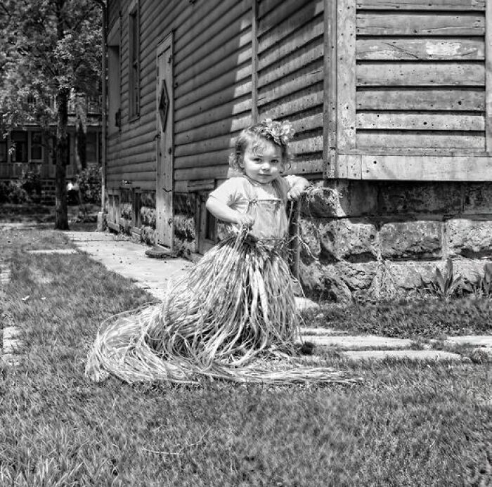 This Is The First Time We've Seen This Little Girl In The Marine Series Of Photos, But She's Doing Her Best As A Hula Dancer In That Souvenir Grass Skirt He Brought Home From Hawaii During Wwii