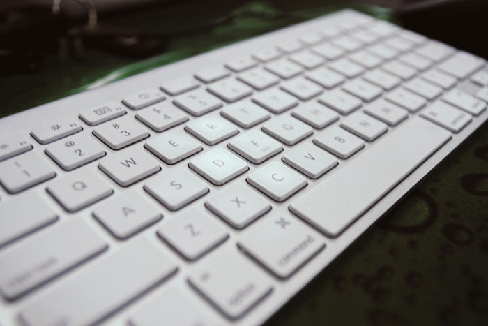 Close-up of a white computer keyboard illustrating hilariously embarrassing attempts at understanding computers.