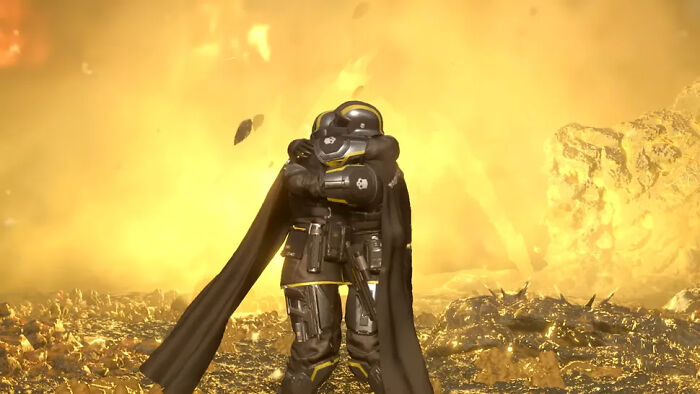 Futuristic armored character in black cape stands amid fiery battlefield in popular game scene gamers could play every day.