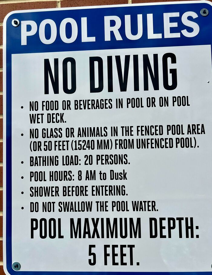 This Sign At The Hotel Pool Chose To Use Millimeters As The Conversion To Metric For Some Reason