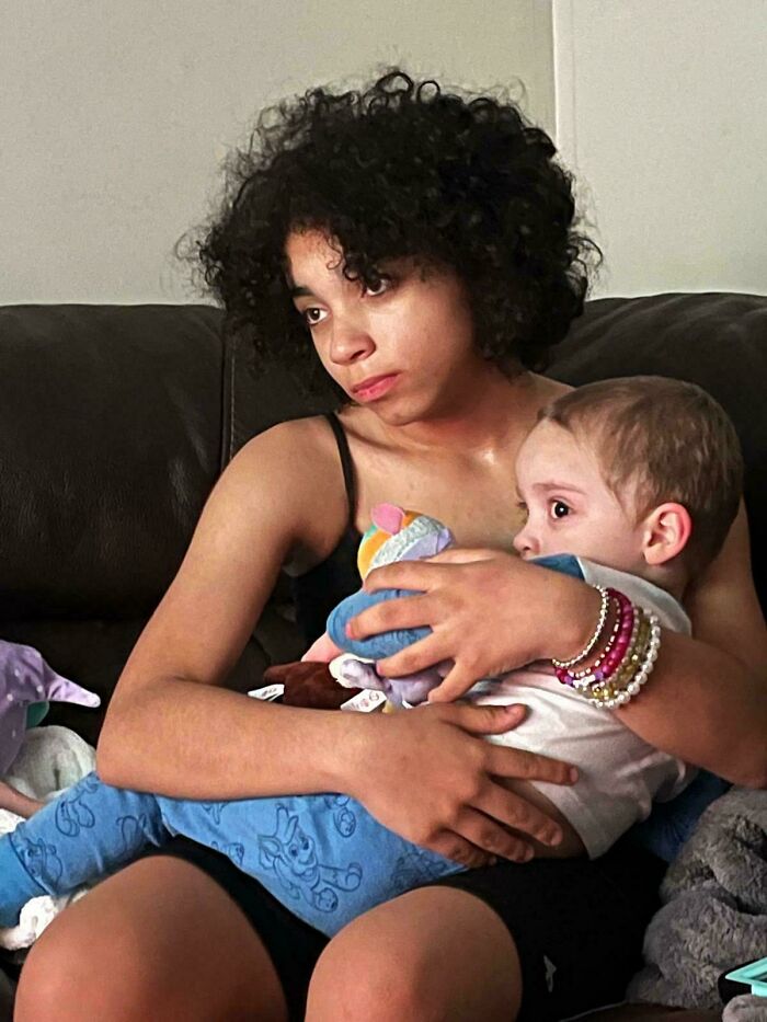 This Picture Of Me Holding My Little Cousin While He Was Crying (He Hit His Head On Something For The 1000th Time)