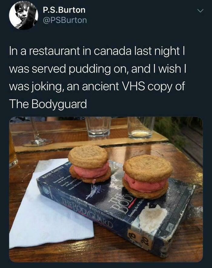 Pudding served on an ancient VHS copy of The Bodyguard in a restaurant showcasing ridiculous food serving ideas.