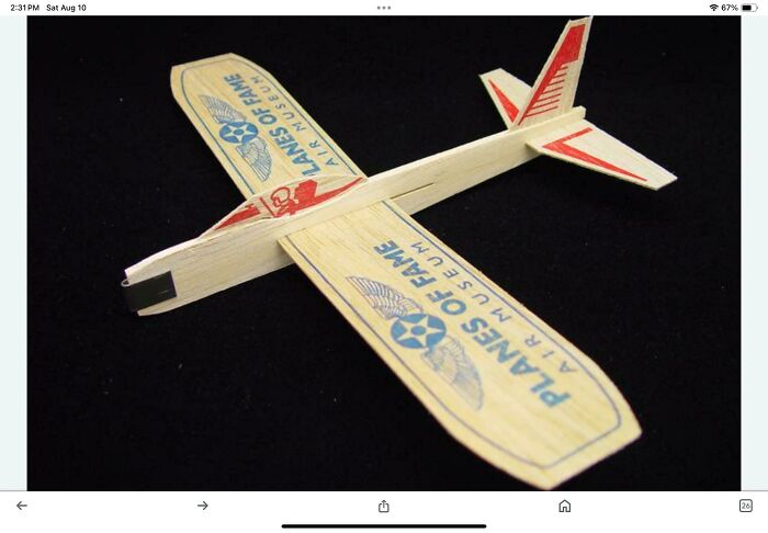 Vintage wooden model airplane from the Planes of Fame Museum, a nostalgic item that may remind you of your creaking joints.