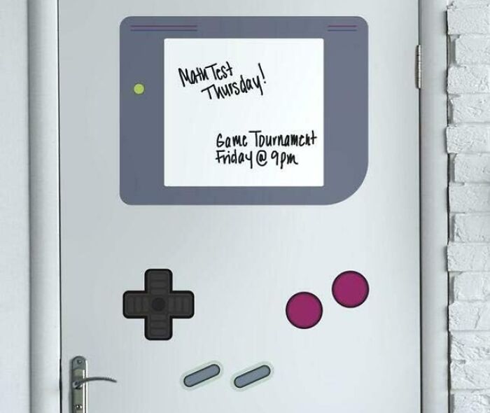 Game console design on a door with notes, bringing joy with playful nostalgia.
