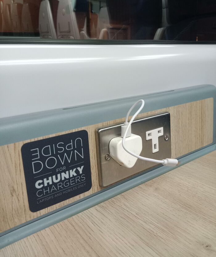These Upside-Down Charger Sockets On A Train Table That Prevent Cable Damage!