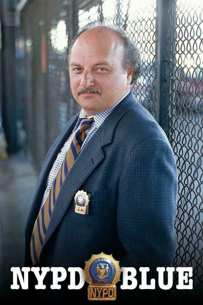 Middle-aged man in a suit with NYPD detective badge, representing nostalgic items that remind you of creaking joints.