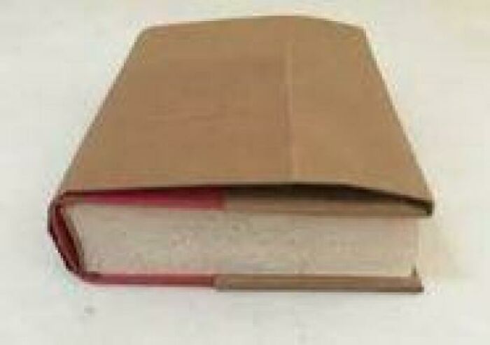 Old hardcover book with a brown dust jacket, representing nostalgic items that may remind you of creaking joints.