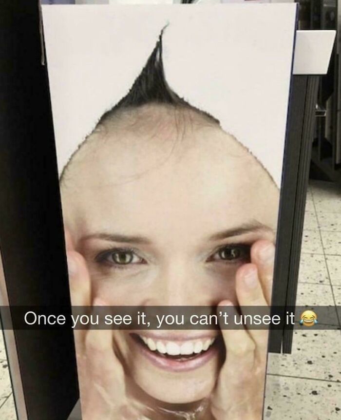 Confusing image of a woman's face with a towel shaped like a nose, creating an optical illusion.