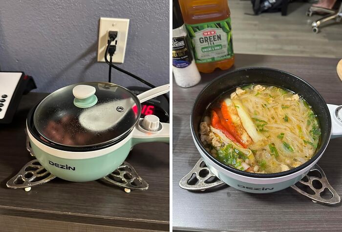 Compact electric pot cooking soup on a dorm room desk, showcasing smart dorm finds for surviving freshman year.