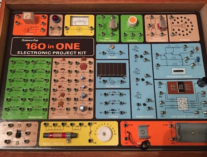 Vintage electronic project kit with resistors, capacitors, and transistors, a nostalgic item for creaking joints memories.