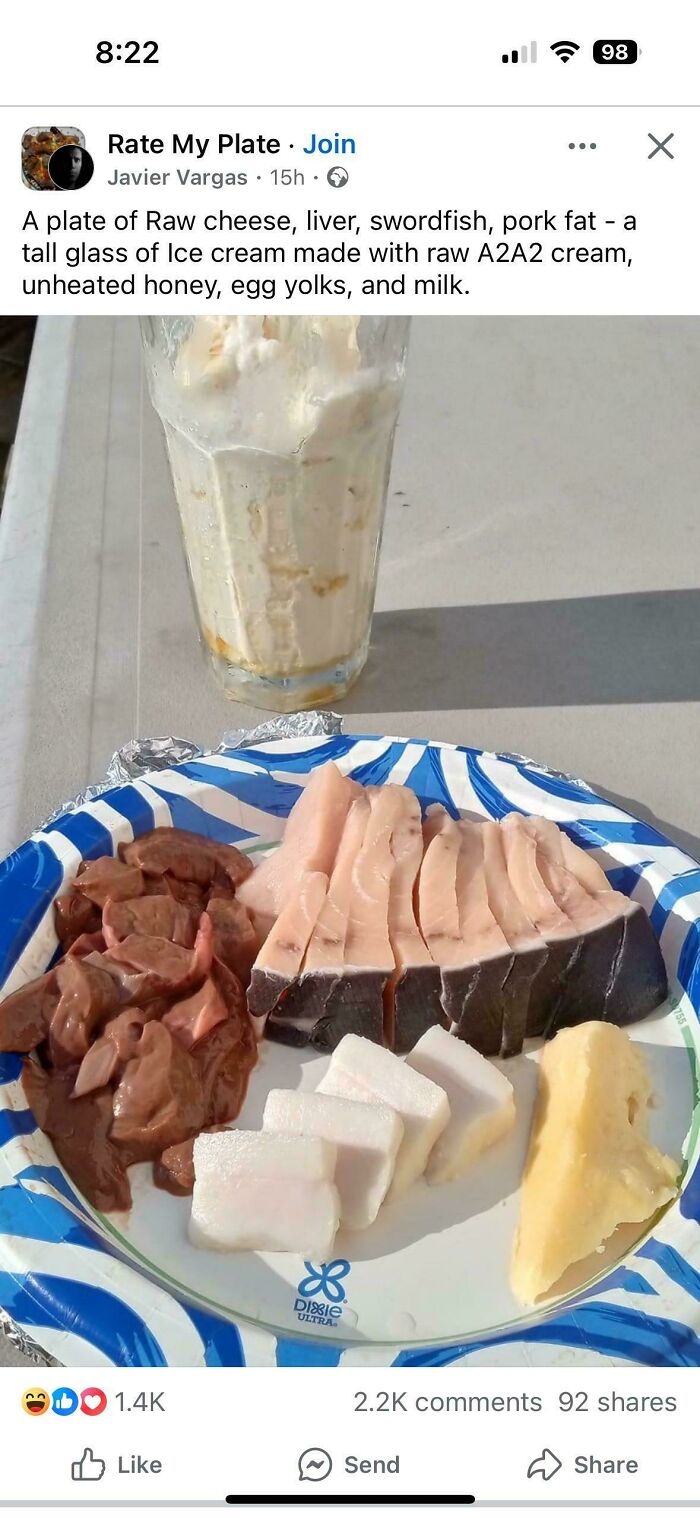 Plate with raw cheese, liver, swordfish, pork fat, and a glass of ice cream; part of unusual dishes collection.