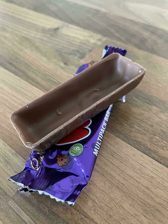 Empty chocolate shell in its wrapper, showcasing a hilariously British snack fail.