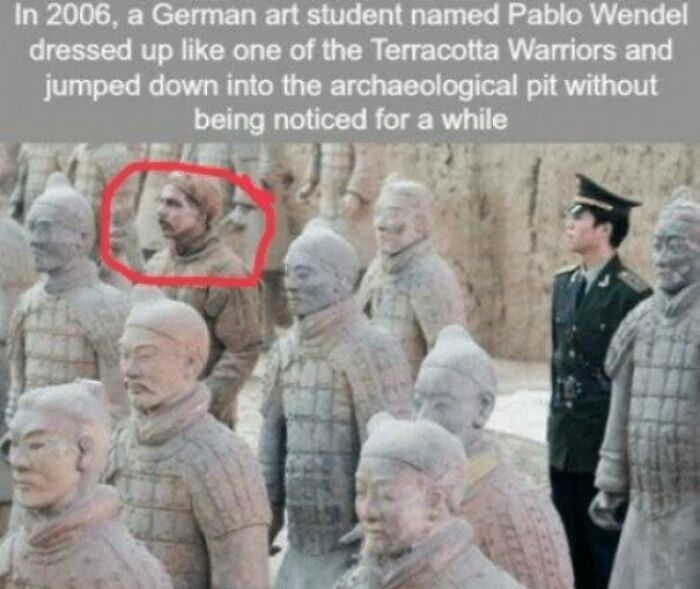 Person dressed as a Terracotta Warrior blends in among statues, highlighting system cheating by acting like they belong.