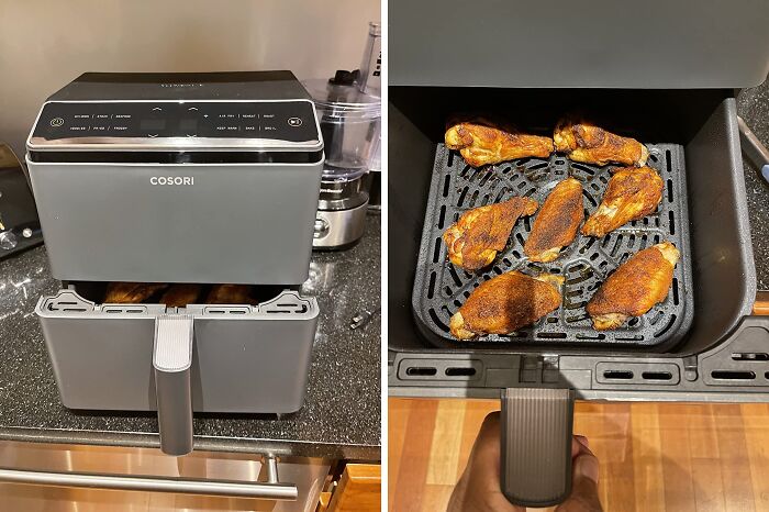 Smart home air fryer cooking chicken wings on a countertop.