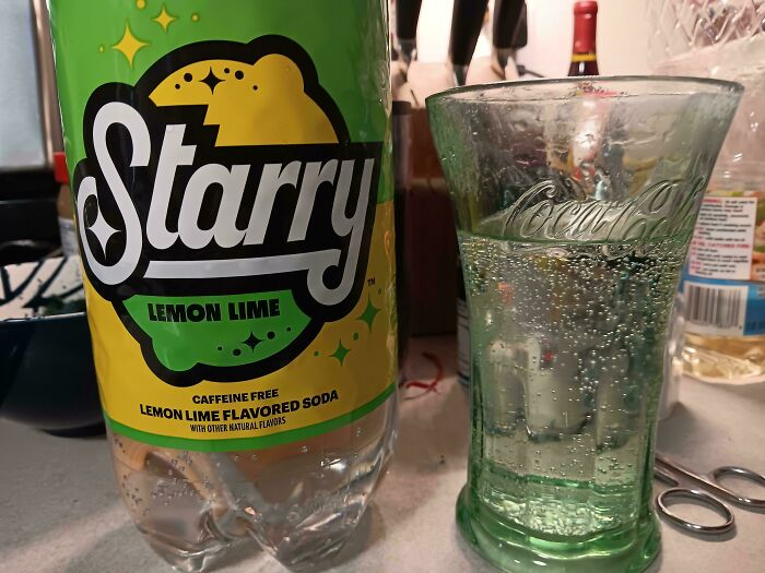 Pouring Starry Into A Coke Glass