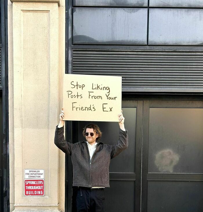 Clever-Dude-With-Sign-Annoying-Things-Protesting